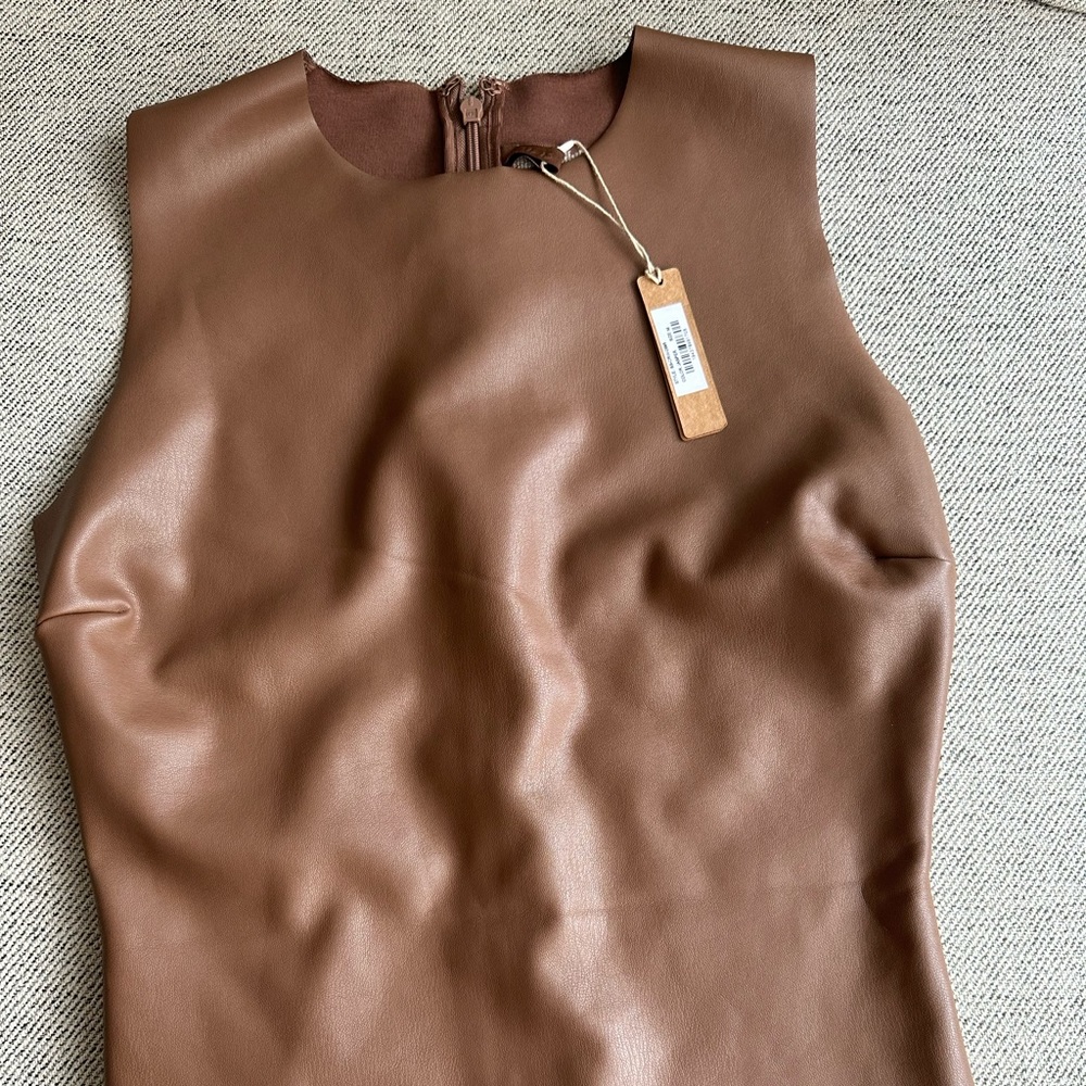 Skims Faux leather bodysuit (thong) in light brown.